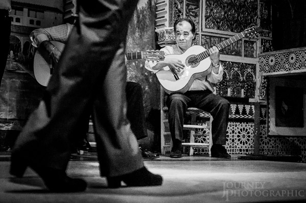 Black and white picture of flamenco dancer and guitar players, Madrid, Spain